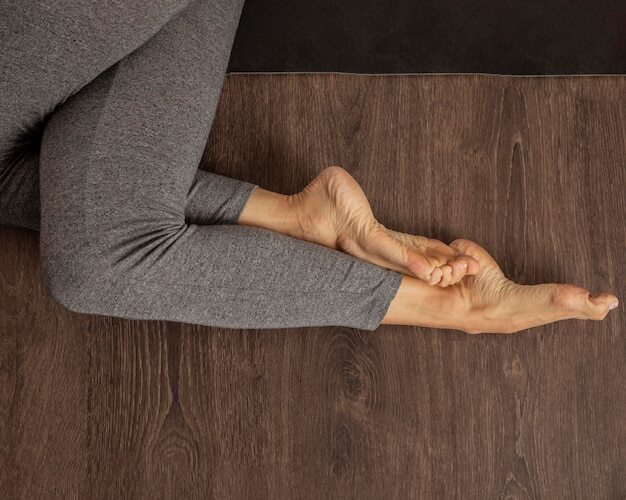 Adult woman doing yoga at home
