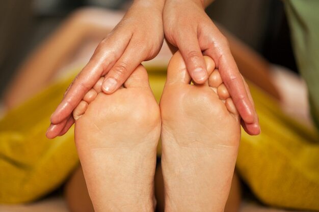 Foot massage for a woman in a spa